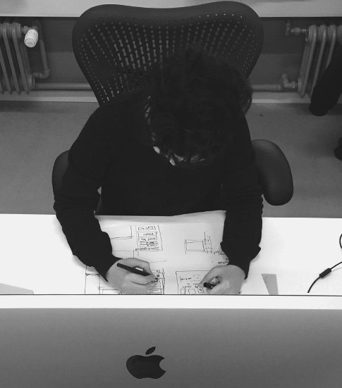Joy working at desk